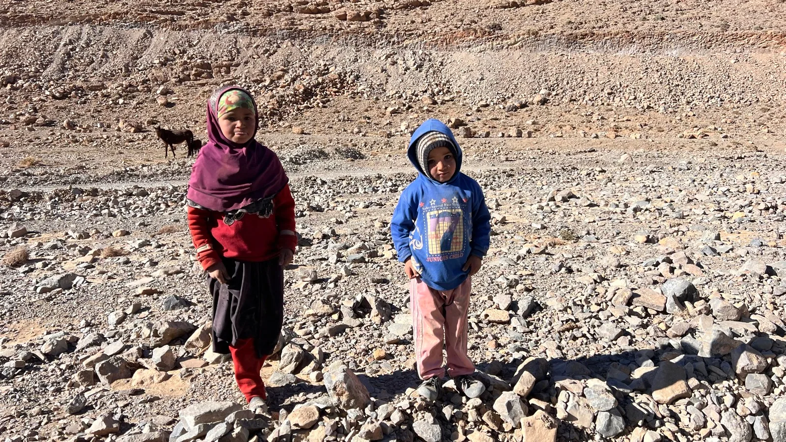 Two children encountered during the March–April 2024 journey through the Moroccan mountains